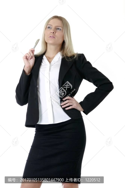 女人拿著一支鋼筆