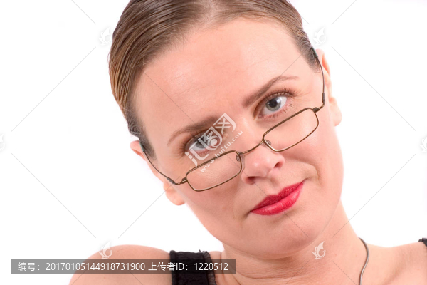漂亮的金發(fā)和緊的發(fā)型和眼鏡