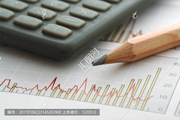 圖表上的鉛筆和計(jì)算器-匯圖網(wǎng) www.fosd68.com 圖表上的鉛筆和計(jì)算器