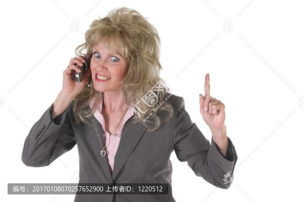 興奮的執(zhí)行業(yè)務(wù)婦女在手機(jī)上