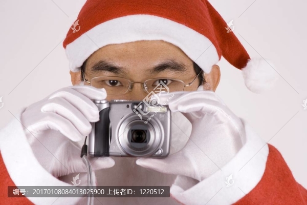 Asian,Santa,Claus帶相機