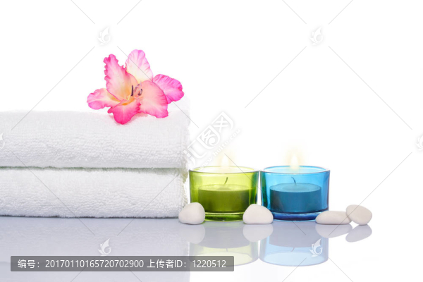 Gladiola；蠟燭；毛巾和白色石頭