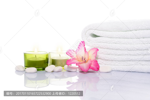 Gladiola；蠟燭；毛巾和白色石頭