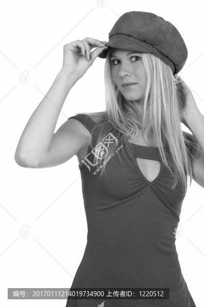 戴帽子的漂亮的年輕女人