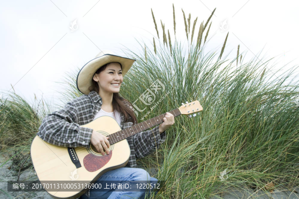 彈吉他