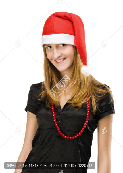 漂亮的女孩在紅色的圣誕老人帽
