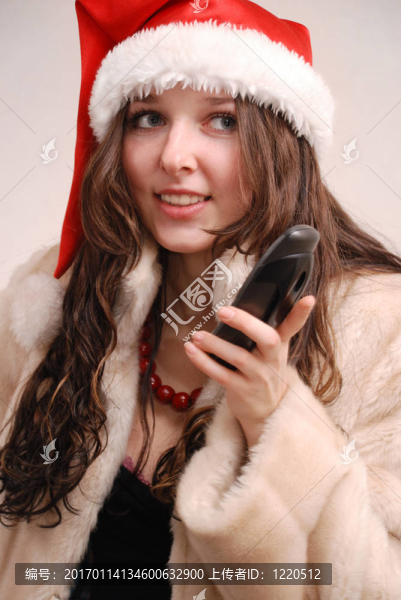 圣誕老人帽中的年輕模特
