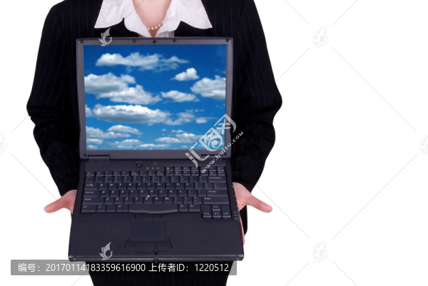 商人拿著筆記本電腦