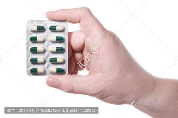 手；綠色藥丸