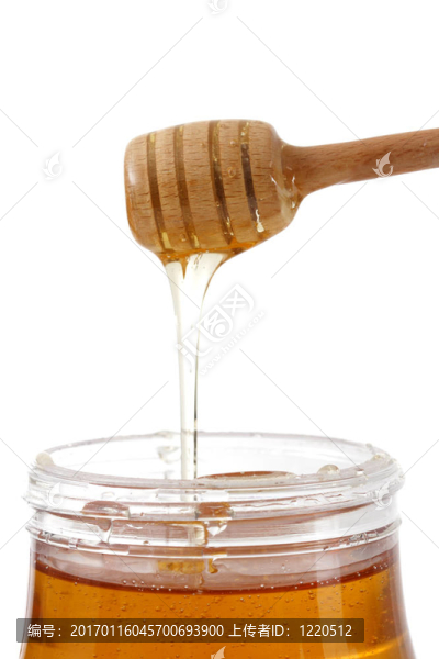 一罐蜂蜜用木棍