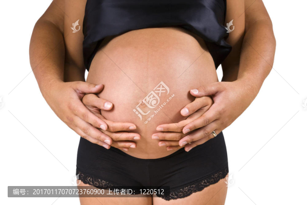 懷孕的婦女和父親的手