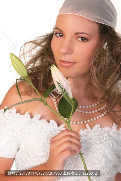 漂亮的新娘手捧莉莉