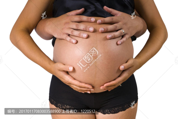 懷孕的婦女和父親的手