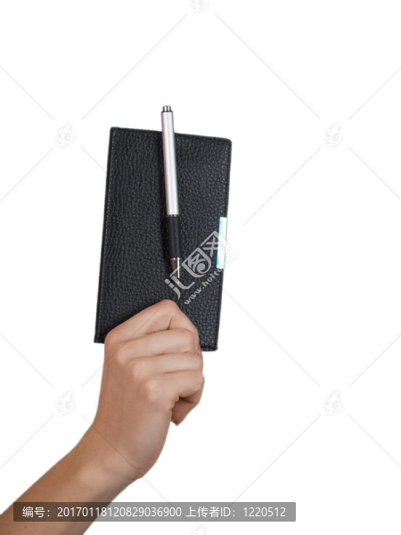 帶著筆記本的手