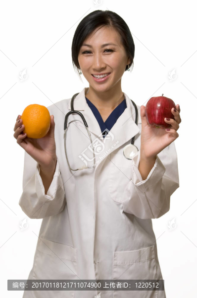 醫(yī)生用蘋果和橘子