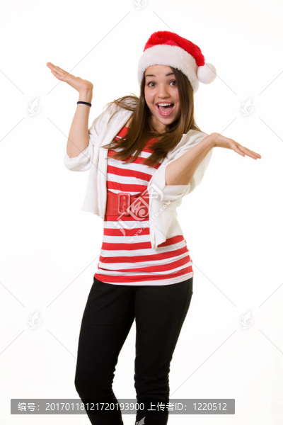 幸福的女人在Santa帽