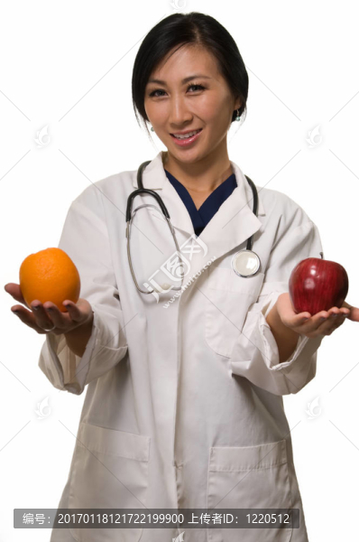 醫(yī)生用蘋果和橘子