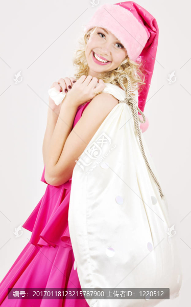 歡快的圣誕老人幫手女孩大袋