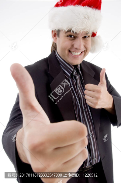 在圣誕帽祝好運(yùn)的商人