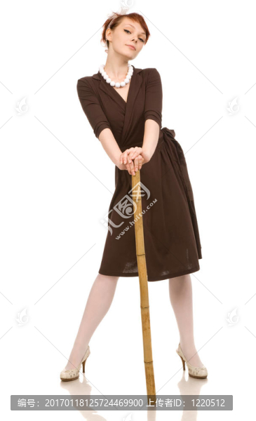 帶竹桿的女人