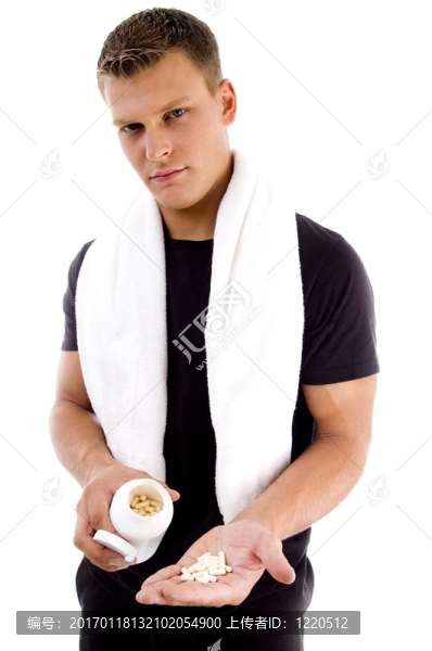 肌肉發(fā)達(dá)的男子在他的手掌顯示藥物-匯圖網(wǎng) www.fosd68.com 肌肉發(fā)達(dá)的男子在他的手掌顯示藥物