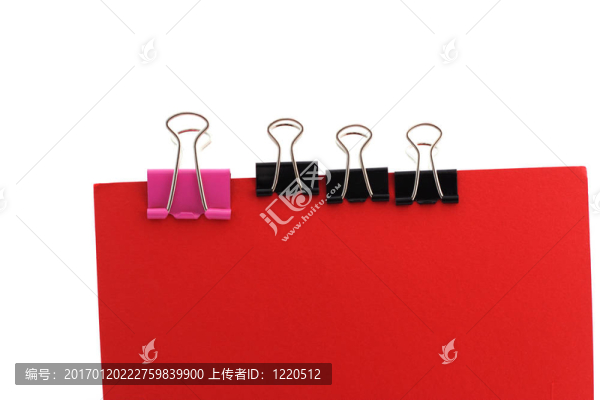 紅色背景上的紙夾