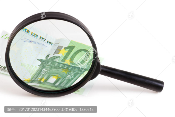 通過放大鏡的鈔票