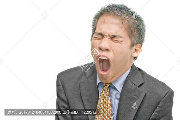 打哈欠的亞洲商人
