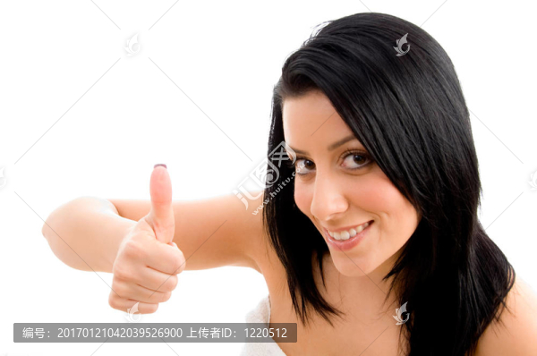 女人在孤立的背景下豎起大拇指的俯視圖