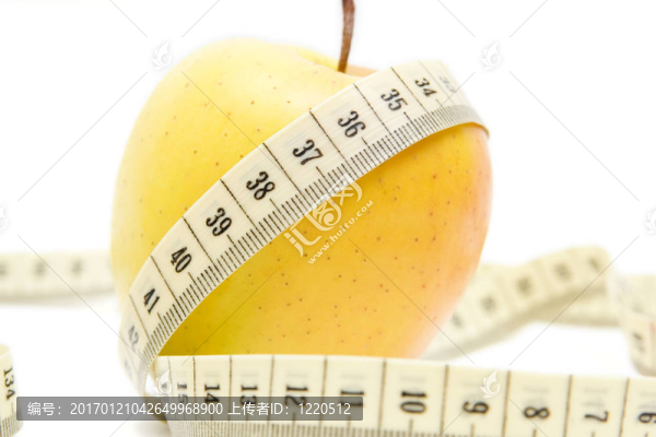 黃色蘋果和測量