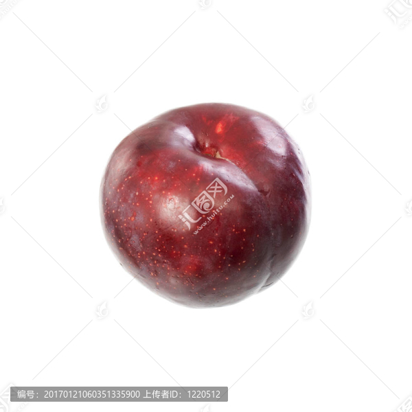 躺在桌子上的一個(gè)紅色的李子