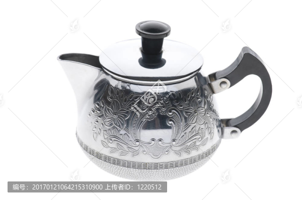 白色背景上的金屬茶壺