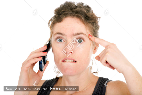震驚的女人在電話里