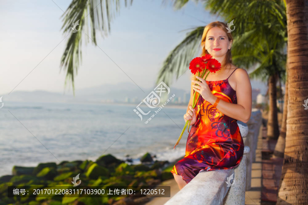 穿著紅色衣服的年輕女人