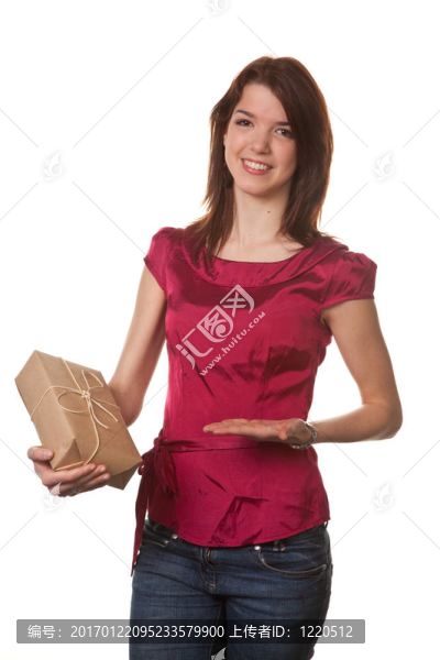 漂亮的年輕女人帶圣誕包