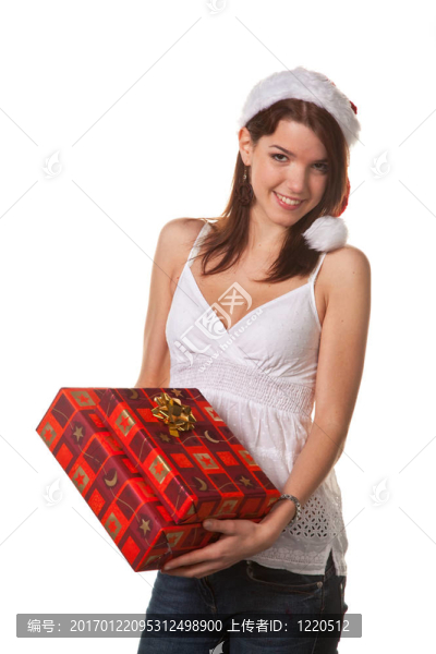 漂亮的年輕女人帶圣誕包