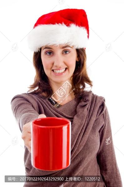年輕的女?dāng)[著她的咖啡杯