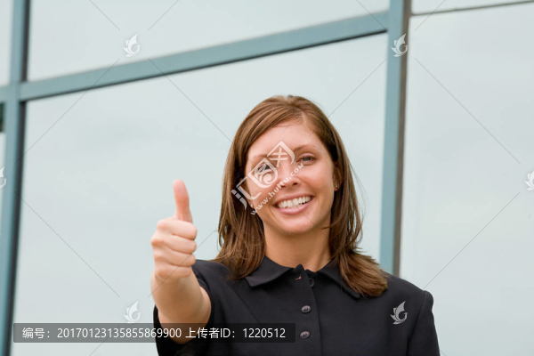 商業(yè)女人豎起大拇指