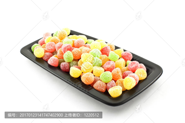 黑色方形盤子上鮮艷的糖果