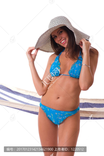 性感的女人穿著比基尼的夏天的帽子