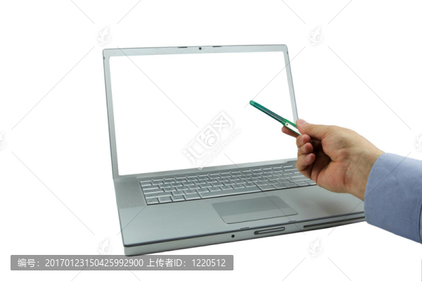 帶有綠色指向筆的筆記本電腦