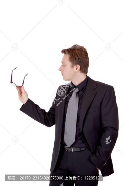 商人拿著眼鏡