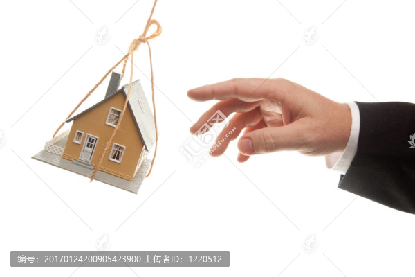 搖擺的房子和商人的手伸手或推