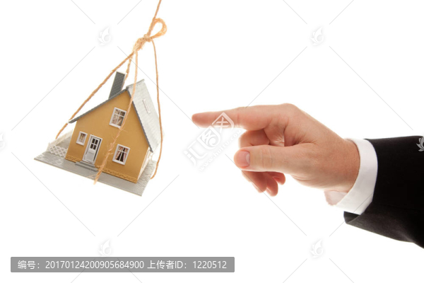 搖擺的房子和商人的手伸向