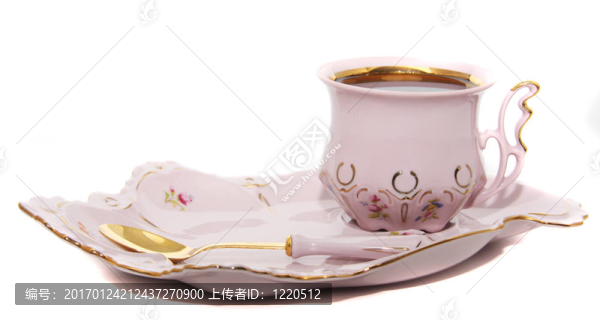 在用湯匙陶瓷咖啡杯