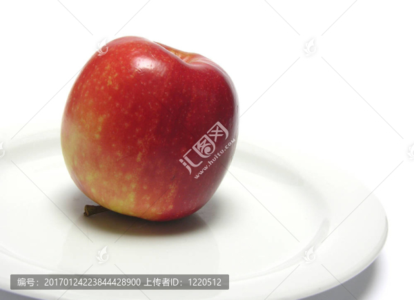 在白色盤(pán)子上的紅蘋(píng)果