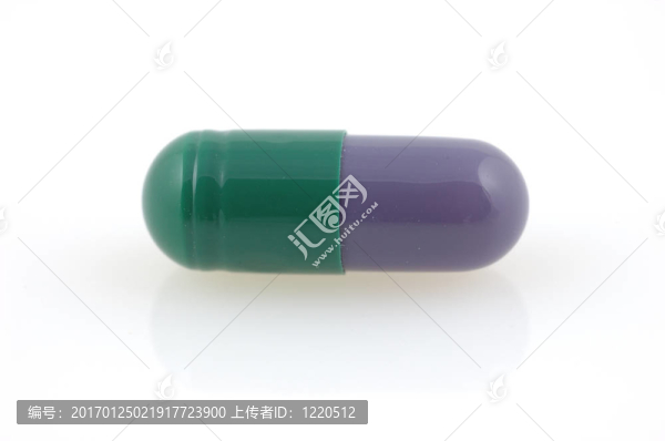 帶反射的綠色和灰色膠囊