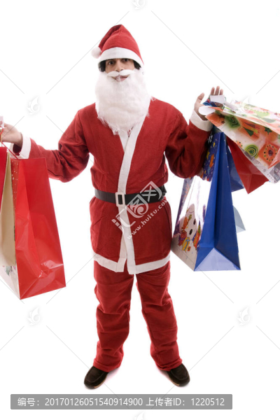 年輕人在Santa服裝；充滿了禮物