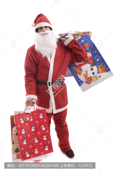 年輕人在Santa服裝；充滿了禮物