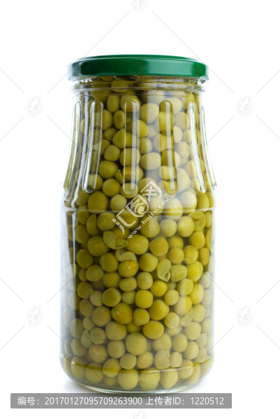 帶有綠色青豆的玻璃罐